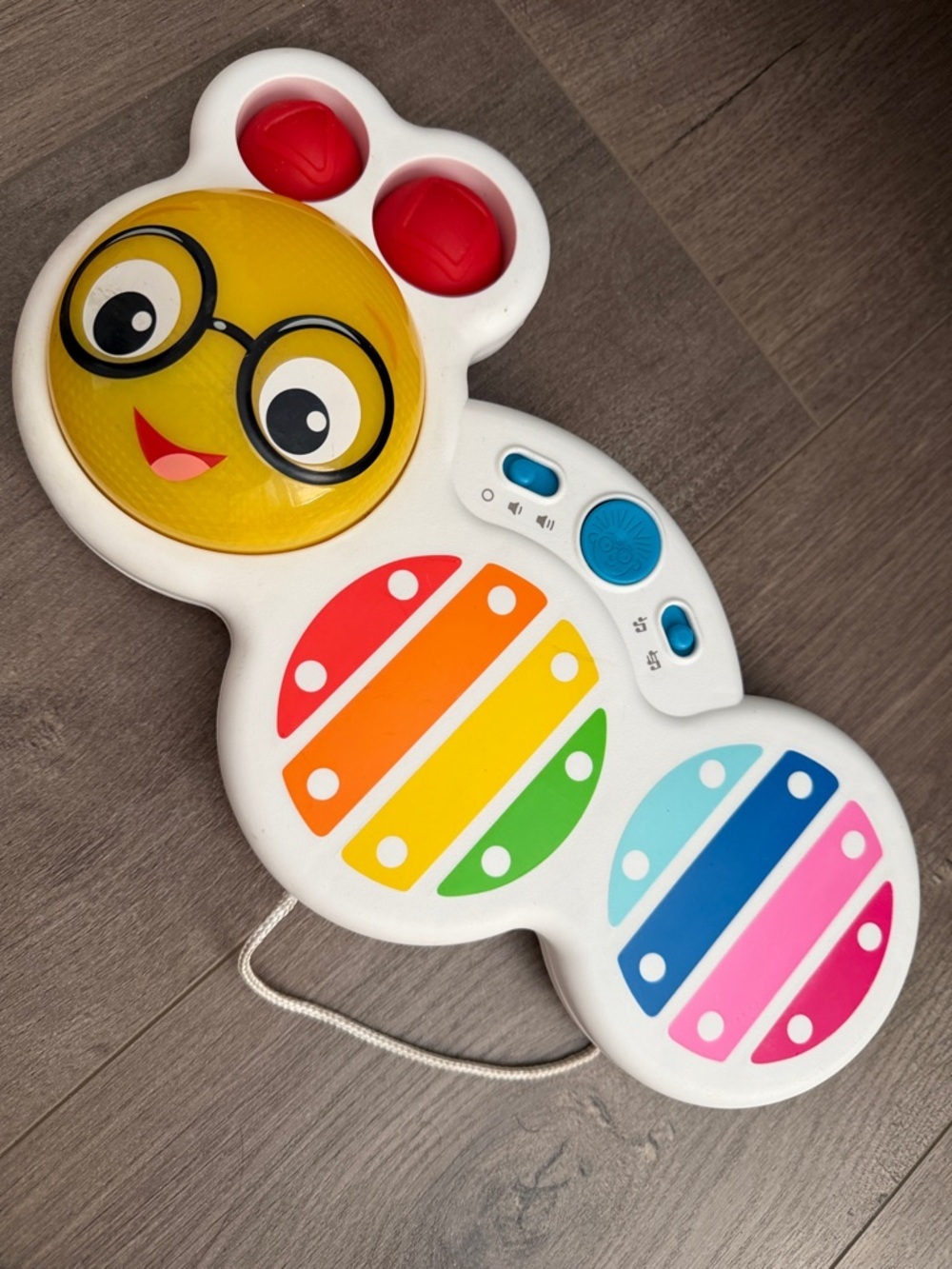 Colorful Pull-Along Musical Caterpillar toy- White with Rainbow Pads